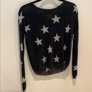 Long sleeve top. With stars on it.